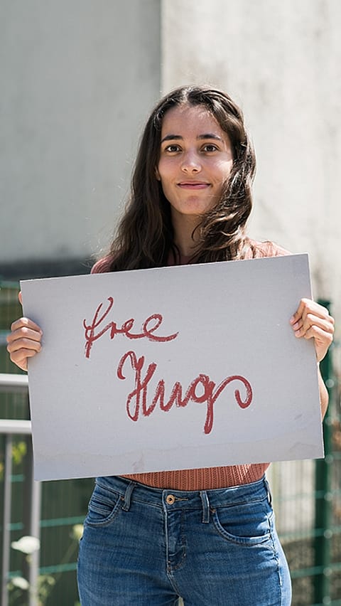 Girl holding a sign